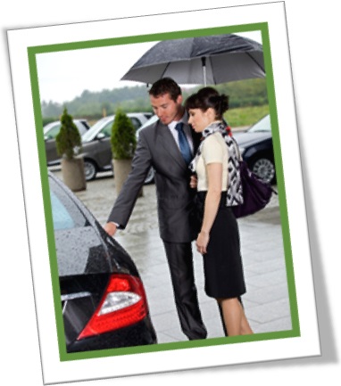 suave man opening the car door for a woman